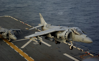 Fighterjet shipdeck ocean landingstrip jigsawpuzzle - a fighter free wallpaper for desktop