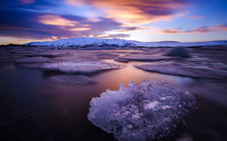 Sunset frozen lake mountains clouds - ice free wallpaper