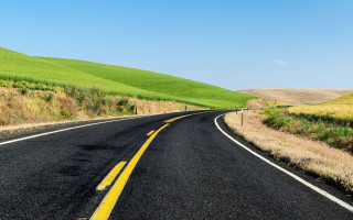 Road green field hill blue - a yellow line free wallpaper