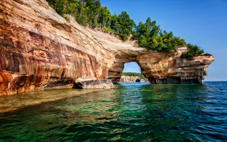 Large rock arch beach water - betye saar free wallpaper