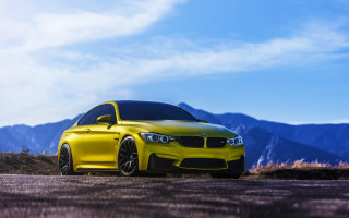 Yellow car mountains road forest - the sky free wallpaper