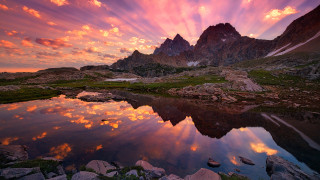 Mountain lake sunset clouds rocks - scene free wallpaper