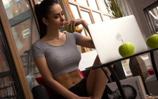 Woman sitting laptop apple graphics - hourglass slim figure free wallpaper