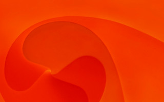 Orange curved abstract black moon - a close up free wallpaper