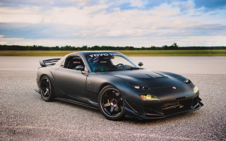 Black sports car cloudy sky - a cloudy sky in the background free wallpaper