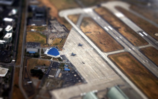 Aerial airport blue tarmac planes - tilt shift free wallpaper