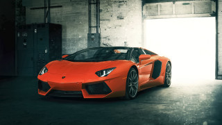 Bright orange sports car garage 2 - orange free wallpaper