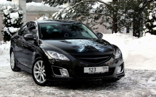 Black car snowy street military - a house and trees free wallpaper