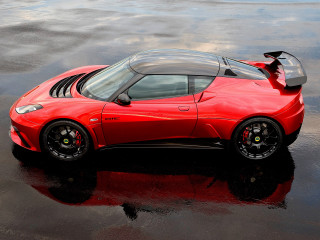 Red sports car wet ground - a red sports car free wallpaper