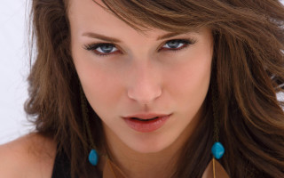 Woman blue eyes necklace serious 2 - piercing eye free wallpaper