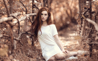 Woman woodland blowing hair serious - the wind free wallpaper