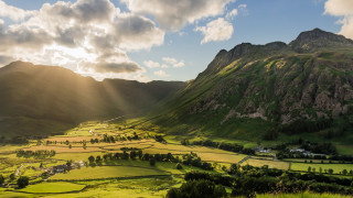 Valley mountain sunbeam clouds landscape - a valley free wallpaper
