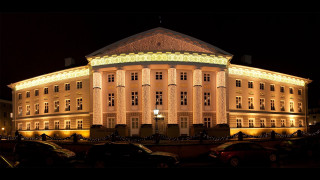 Large building lit dome night - car free wallpaper