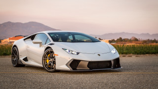 White sports car mountain sunset - the side of the road in front free wallpaper