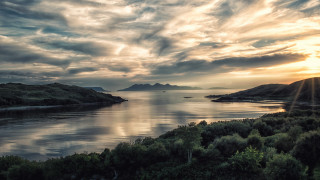Sunset lake mountains clouds horizon - a beautiful sunset over a lake free wallpaper
