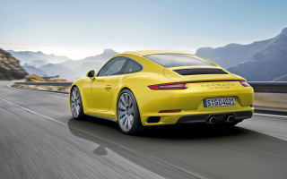Yellow porsche mountain road sky - yellow free wallpaper