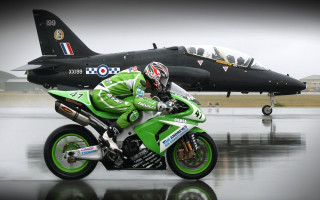 Man green motorcycle jet runway - great composition free wallpaper