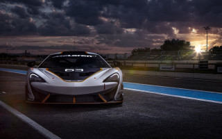 White sports car sunset cityscape - the sun behind free wallpaper