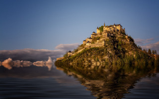 Castle island ocean clouds reflection - a small island in the middle of the ocean free wallpaper