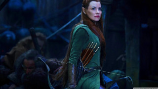 Woman green dress bow arrow - weta digital free wallpaper