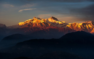 Mountain range sunset clouds dusk - a sunset in the background free wallpaper