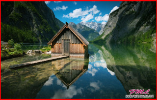 Small wooden cabin lake mountains 3 - hillside free wallpaper