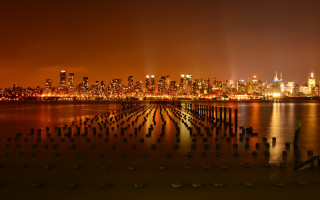 City skyline night reflection pier - evaline ness free wallpaper