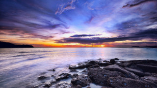 Sunset water rocks sailboat city - rock free wallpaper