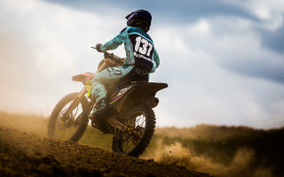 Dirt bike rider sunny sky - a person riding free wallpaper