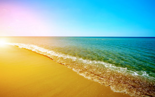 Beach wave sun shore ocean - a beach free wallpaper for desktop