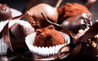 Chocolate assortment ribbon bow rococo - a ribbon free wallpaper