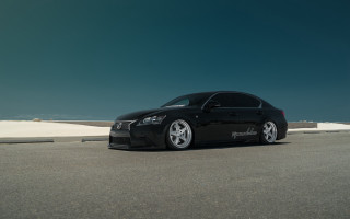 Black car road building sky - clean line free wallpaper