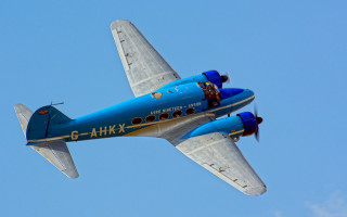 Blue white airplane sky clouds - art deco free wallpaper