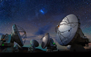 Satellite dishes night sky shooting - star in the distance free wallpaper