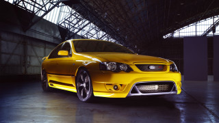 Yellow car garage roof window - a garage free wallpaper