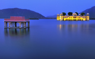 Large water building mountains night - christo free wallpaper
