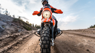 Motorcycle rider woods mountains beach - a dirt road free wallpaper