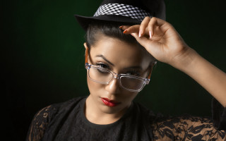 Woman glasses hat checkered blackshirt - new objectivity free wallpaper