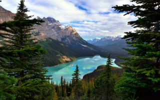 Lake mountains trees cloudy sky 26 - a view of a lake free wallpaper