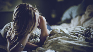 Woman concerned blonde bed portrait - bed free wallpaper