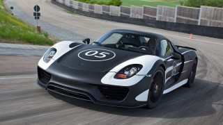 Black white sportscar driving road - plasticien free wallpaper