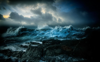 Stormy water mountains reflection boat - a large body of water free wallpaper