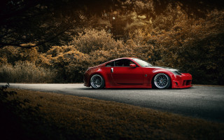 Red sports car night parked - dreamy free wallpaper