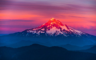 Mountain sunset pink purple cloudy - peak in the background free wallpaper