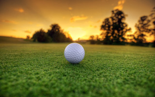 Golf ball green field sunset - subsurface free wallpaper