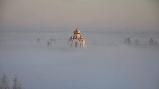Church foggy field trees sky - volumetric fog free wallpaper