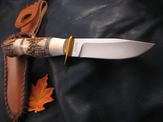 Knife gold handle black leather - gold free wallpaper
