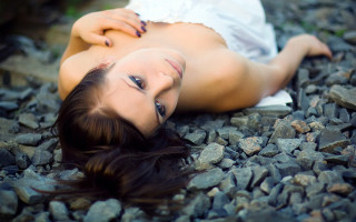 Woman rocks blowing hair portrait - the wind free wallpaper