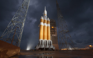 Rocket stand dark sky clouds - a rocket free wallpaper