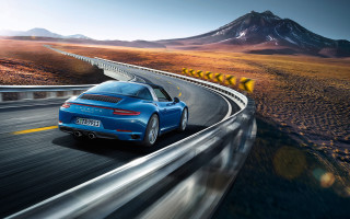 Blue sports car mountains yellow - a blue sports car free wallpaper for desktop